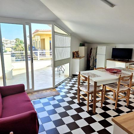 Апартаменты Terrazza Sul Porto Скольитти Экстерьер фото